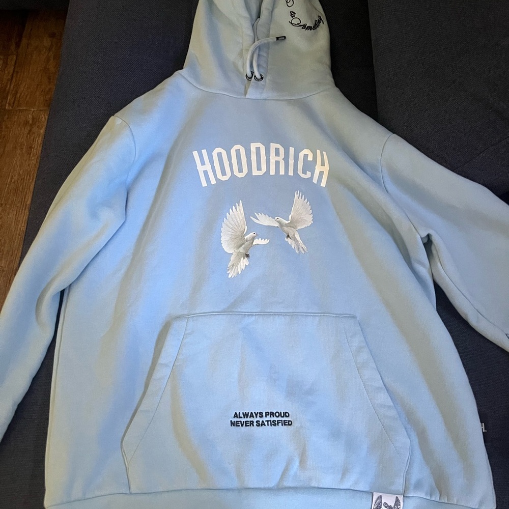 Light Blue Hoodie with Graphic Design